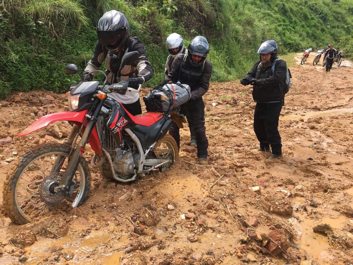 How Much Should You Tip a Motorbike Tour Guide in Vietnam? vietnam offroad motorbike tour scaled - How Much Should You Tip a Motorbike Tour Guide in Vietnam?