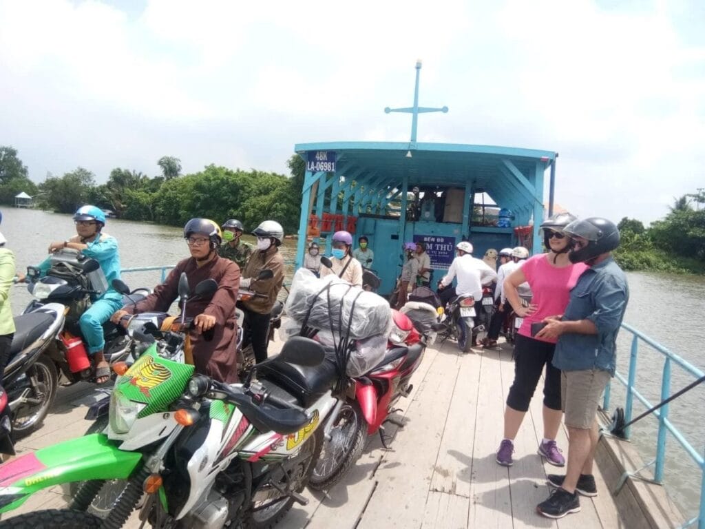 When to avoid riding motorbikes to Mekong Delta in Vietnam? floating market on mekong delta 1 1024x768 - When to avoid riding motorbikes to Mekong Delta in Vietnam?